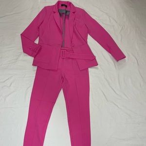 Hot pink pants suit